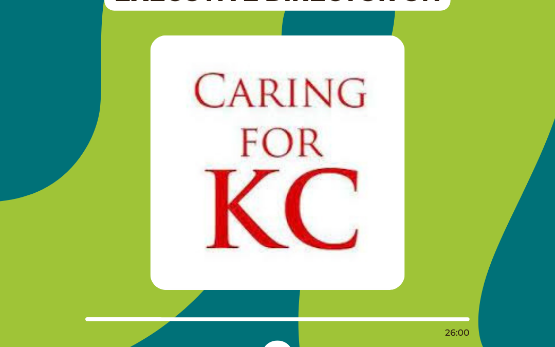 Picture with Caring for KC logo in a phone music player