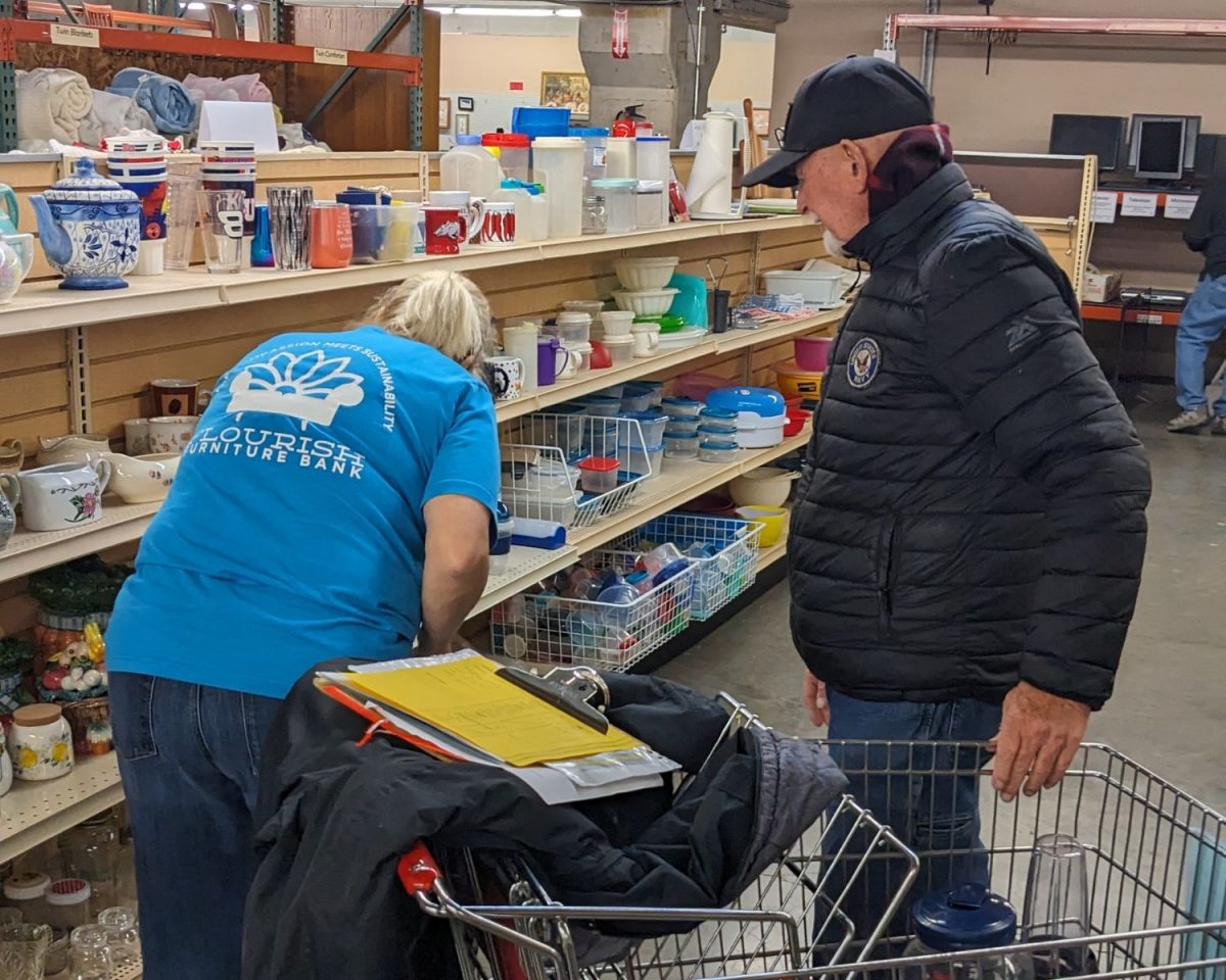 Jerry, guest, and Jerri, Flourish volunteer, shop for decor